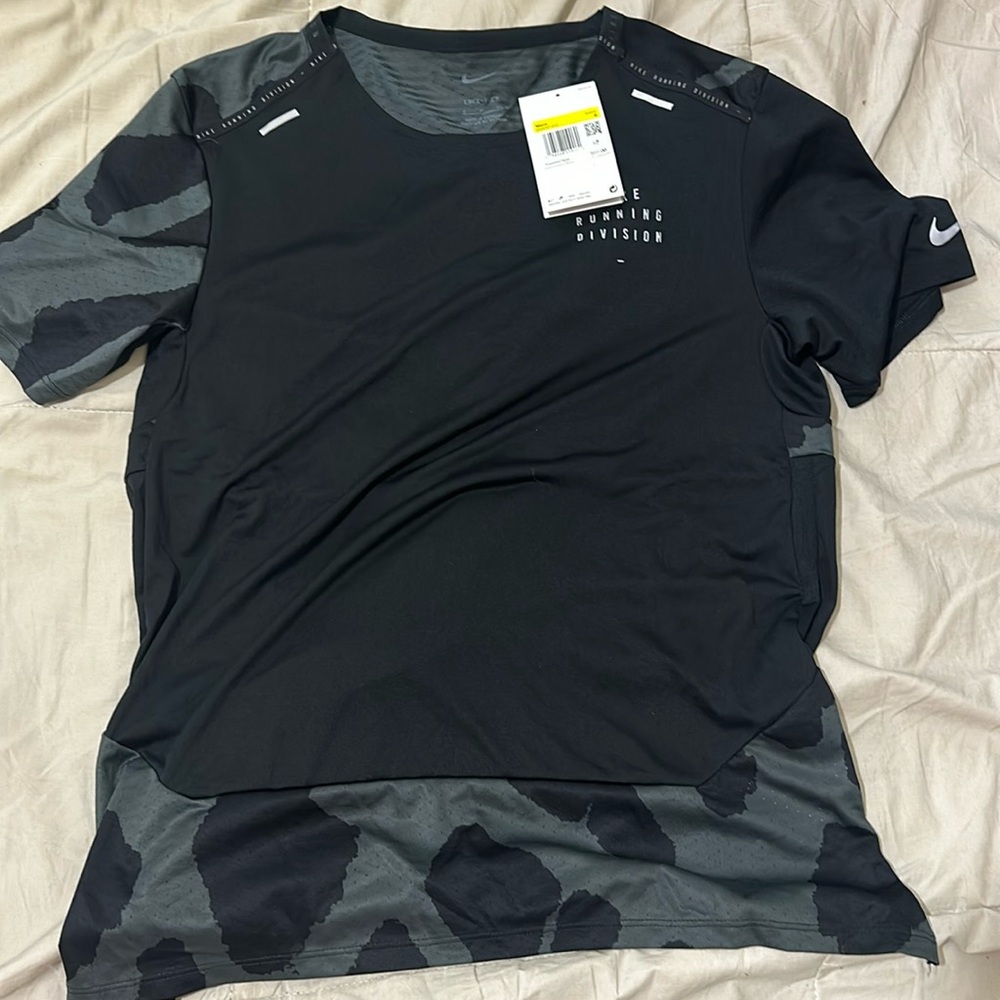 Men’s Nike Dri Fit running shirt.